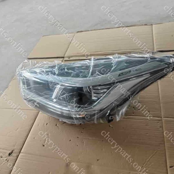 605000634AA HEAD LAMP LEFT 82